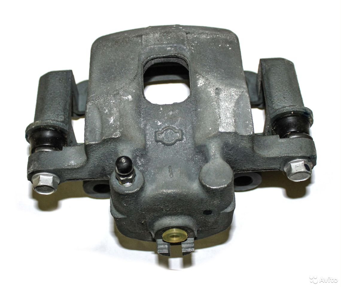 Суппорт тормозной передний правый Nissan 41001-09W00