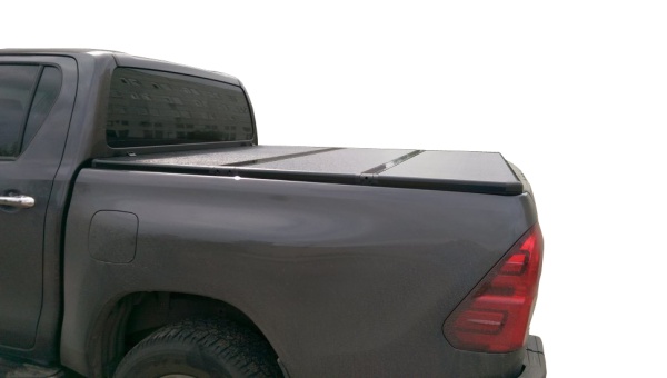 Жесткая трехсекционная крышка Toyota Hilux VIII Revo 7033153