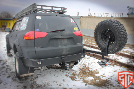 Бампер задний Mitsubishi Pajero Sport 2008-2015 калитка центр, под ПТФ STC-MPS2-BR-C1-L2