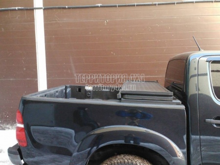 Крышка алюминиевая трехсекционная Ruggedliner на Toyota Hilux (2006-2014) -726682